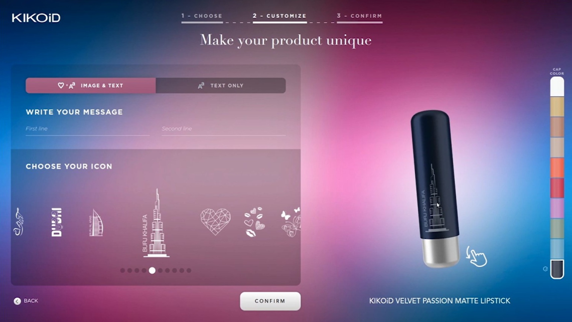 Kiko webpage of the 3D lipstick configurator in 3 steps. Here you are at the second step to customize the product with an image and a text or with a text only. In this step, you can also choose the color of the cap of your lipstick (blue cap here). 3D viewer on the right side of the screen