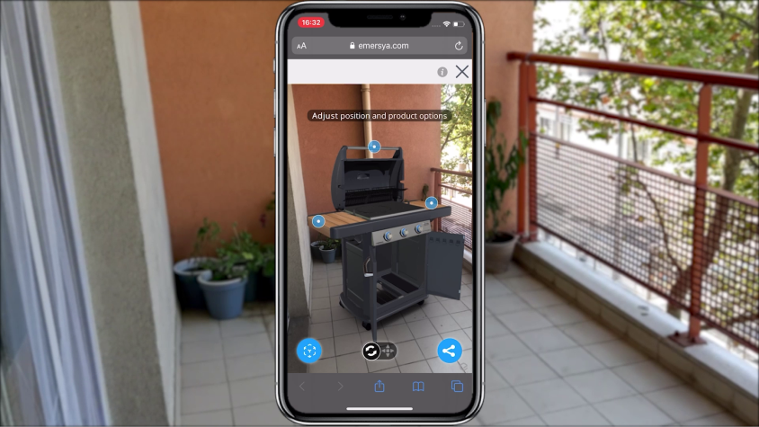 Campingaz gas barbecue shown in context using Augmented Reality on a mobile device. The mobile user is on their balcony, visualizing the barbecue to scale and triggering the 3D animations.