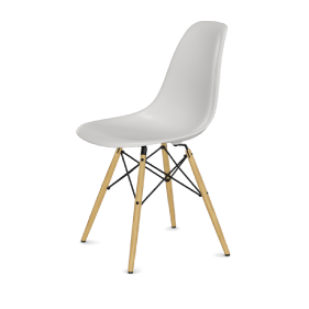 Picture of an Eames DSW plastic chair ash wood base. The color of the plastic chair seat is white.