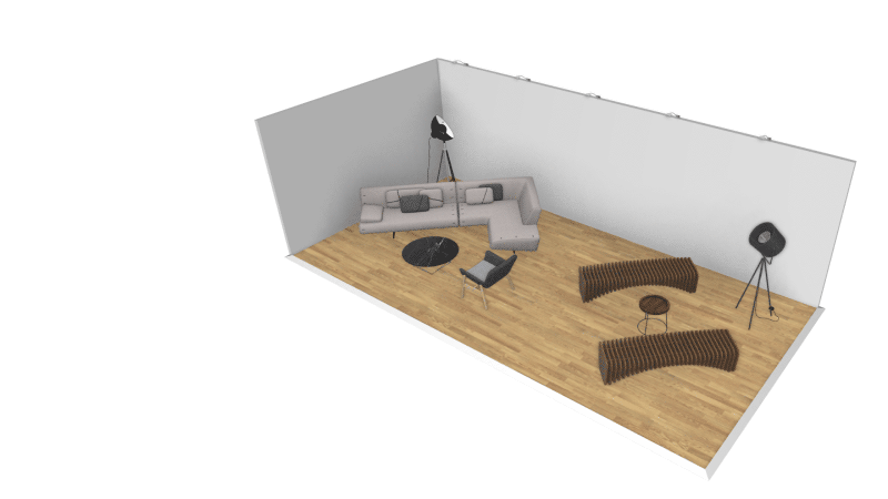 Real-time 3D render of a living space in which different 3D models of furniture items have been placed. The room has the left and back wall with spot lights along the back wall and floor space of 32m squared covered in parquet flooring. The is a hollywood lamp in the back corner and an L-shaped sofa with a marble topped coffee table in front of it and an upholstered armchair opposite. On the right-hand side of the room there are two wooden slatted benches facing each other with a small wooden coffee table in the middle and a spotlight lamp in the right-hand corner.